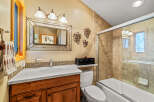 This stunning bathroom boasts a unique design with a touch of artistic flair.