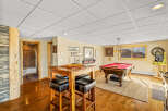 This stunning property boasts a spacious game room, perfect for entertaining and relaxation.