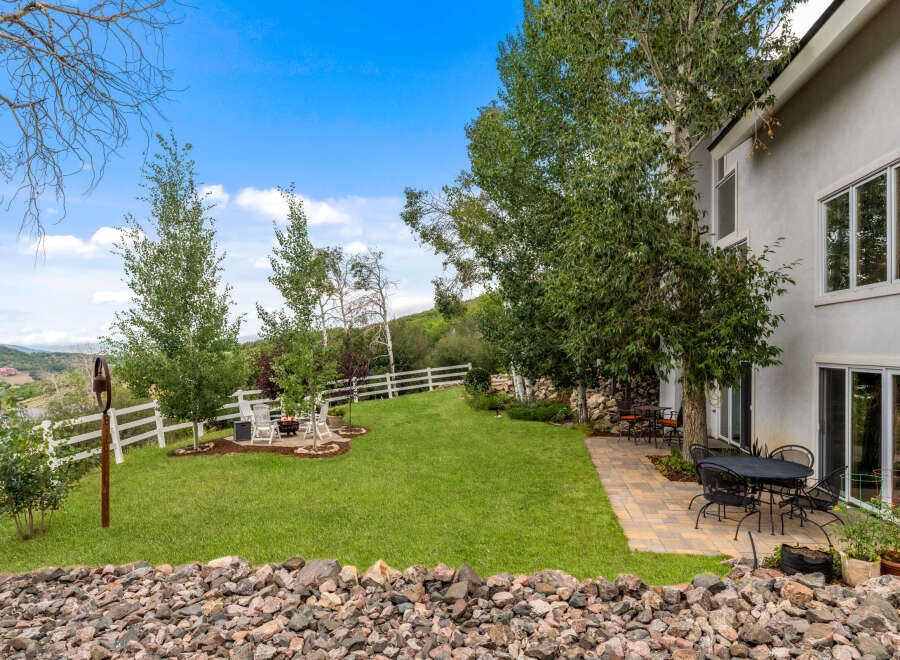 This stunning property boasts a beautifully landscaped yard, perfect for outdoor entertaining.