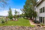 This stunning property boasts a beautifully landscaped yard, perfect for outdoor entertaining.
