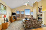 This stunning living room boasts a cozy fireplace, perfect for chilly evenings.