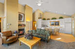 Step into this inviting living space, featuring a cozy fireplace and a comfortable seating area.