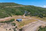 Nestled in a serene landscape, this property boasts a stunning residence with ample space and privacy.