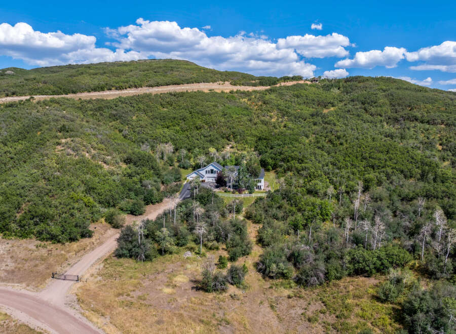 Nestled in the heart of nature, this stunning property offers unparalleled privacy and breathtaking views.