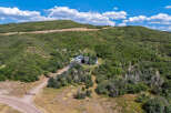 Nestled in the heart of nature, this stunning property offers unparalleled privacy and breathtaking views.