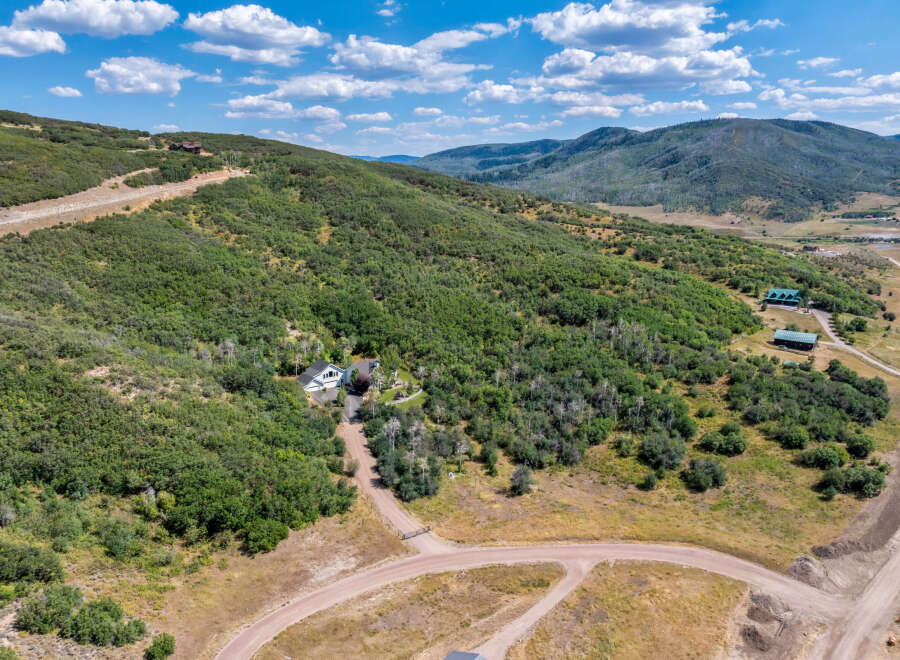 Nestled in the heart of nature, this stunning property offers unparalleled privacy and breathtaking views.