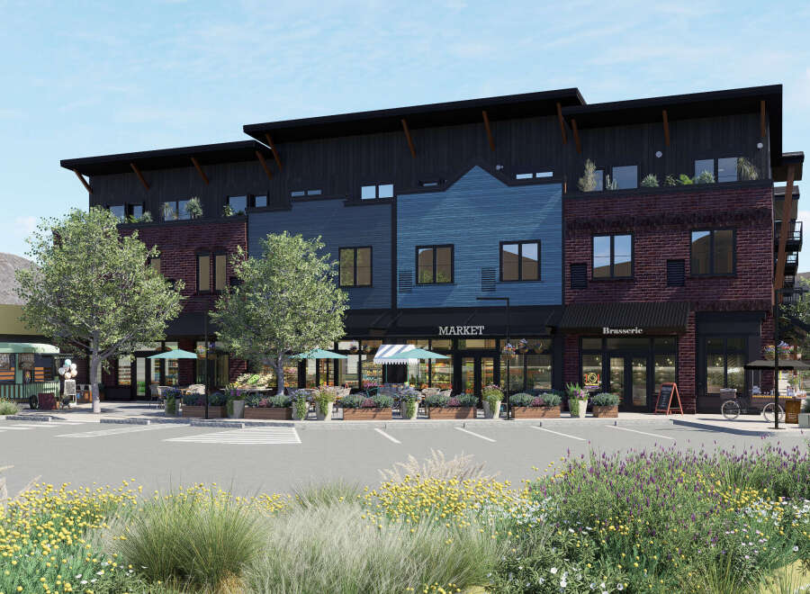 This stunning commercial property boasts a modern design with a mix of brick and wood siding, creating a unique and inviting facade.
