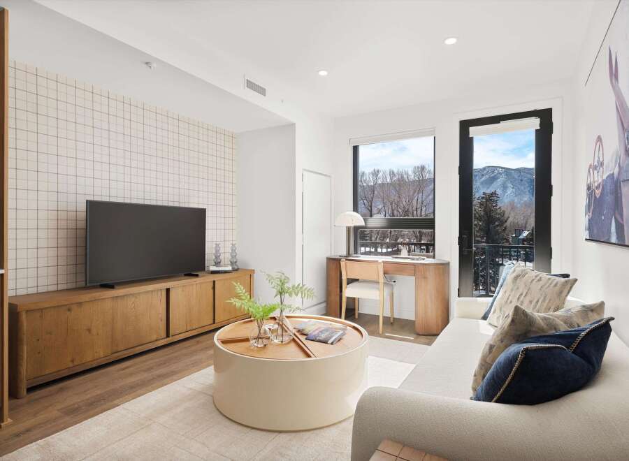 Experience luxury living in this stunning property, featuring a modern design and breathtaking mountain views.