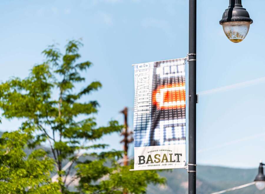 Discover the charm of Basalt, Colorado! This image showcases a banner for the historic downtown, a vibrant area with unique shops and dining.