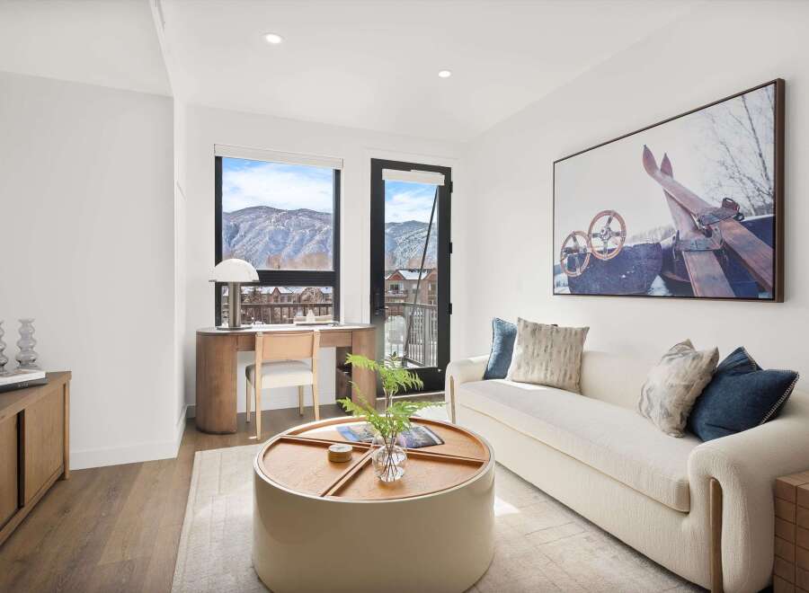 Experience luxury living in this stunning property, featuring a bright and airy living space with breathtaking mountain views.