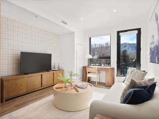 Experience luxury living in this stunning property, featuring a modern design and breathtaking mountain views.