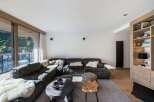 This stunning living room boasts a modern design with a cozy atmosphere.