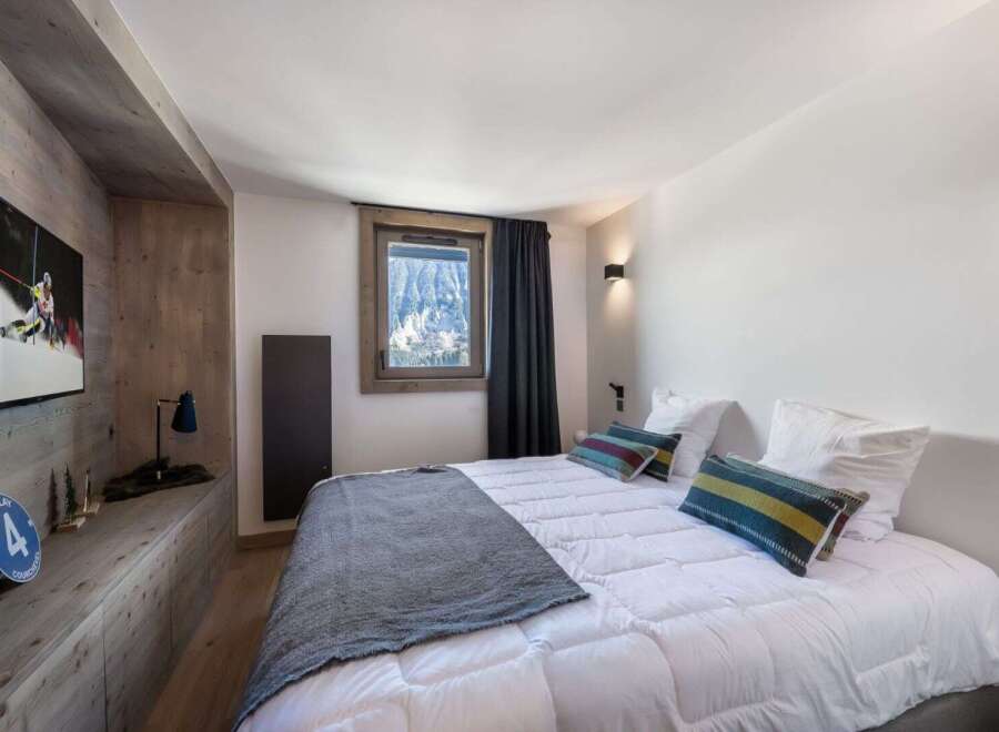 Experience the ultimate in alpine luxury in this stunning bedroom.
