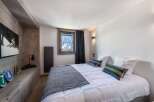Experience the ultimate in alpine luxury in this stunning bedroom.