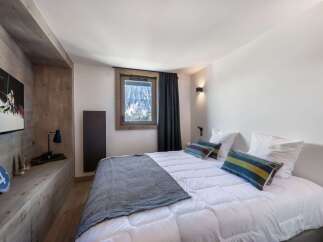 Experience the ultimate in alpine luxury in this stunning bedroom.