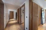 Step into a world of rustic elegance with this stunning hallway.