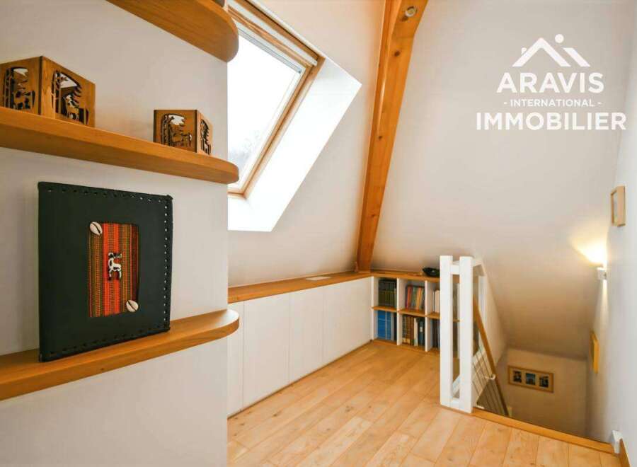 Discover the charm of this unique property, featuring a beautifully designed interior with wooden accents and a bright, airy atmosphere.