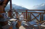 Enjoy breathtaking mountain views from this stunning balcony.