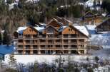 Discover the charm of this stunning ski chalet nestled in a picturesque mountain setting.