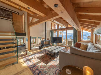 Experience the epitome of luxury living in this stunning chalet, boasting breathtaking mountain views.