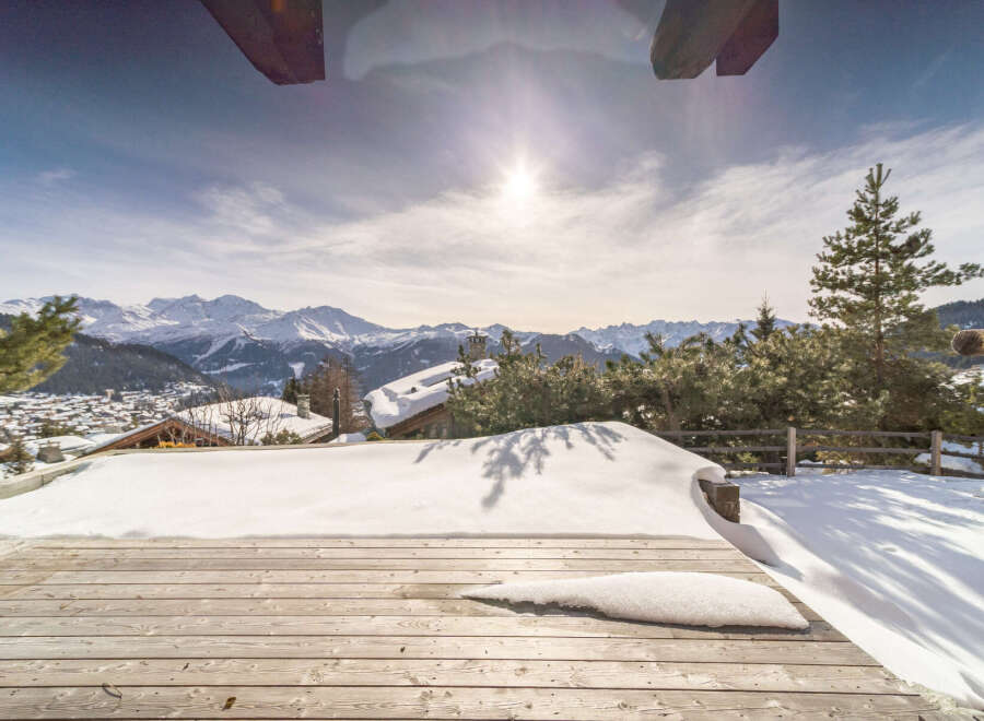 Experience the ultimate winter escape in this stunning property with breathtaking mountain views.