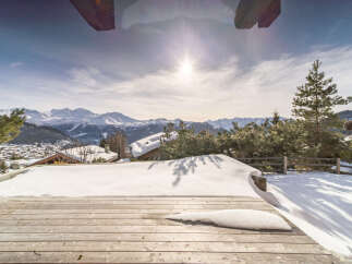 Experience the ultimate winter escape in this stunning property with breathtaking mountain views.