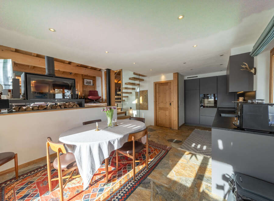 Step into luxury with this stunning property featuring a cozy fireplace, perfect for those chilly evenings.