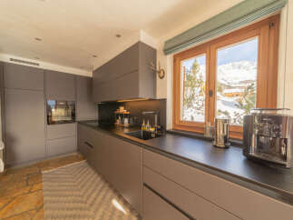 Experience the epitome of modern living in this stunning kitchen.