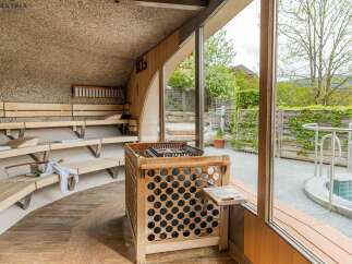 Experience ultimate relaxation in this luxurious sauna retreat.