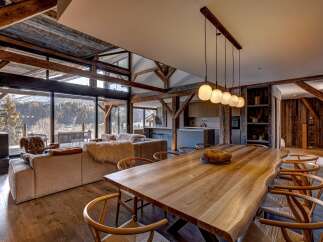 Experience luxury living in this stunning property, featuring a spacious open-plan design and breathtaking mountain views.