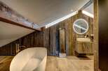 Experience rustic elegance in this stunning bathroom.