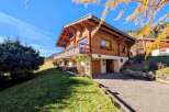 Discover the charm of this stunning wooden chalet nestled in a picturesque setting.