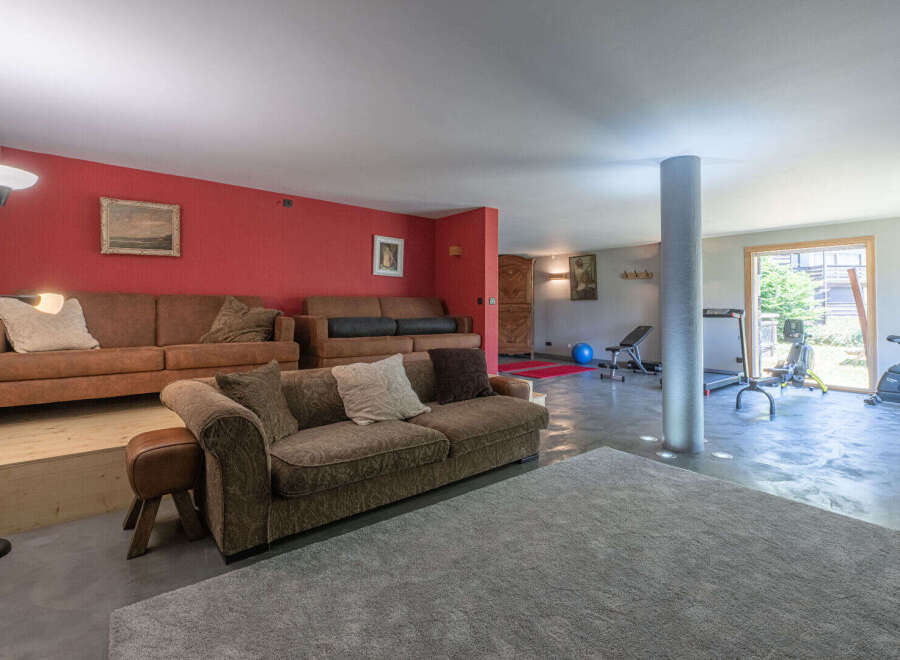 This stunning property boasts a spacious living area, perfect for relaxation and entertainment.