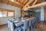 Experience luxury living in this stunning property, featuring a spacious dining area perfect for entertaining.