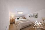 Discover the charm of this cozy bedroom, perfect for a relaxing retreat.