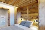 Experience rustic elegance in this stunning bedroom.