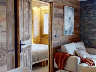 Step into rustic elegance with this stunning property, showcasing exquisite wooden paneling throughout.