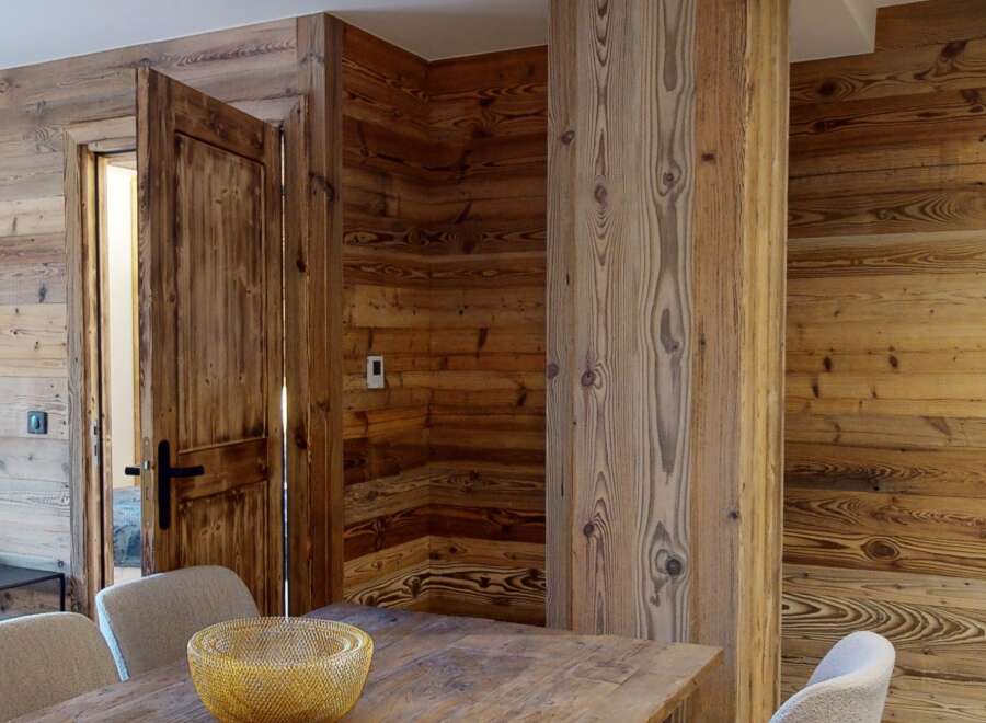 This stunning property boasts exquisite wooden paneling throughout, creating a warm and inviting atmosphere.