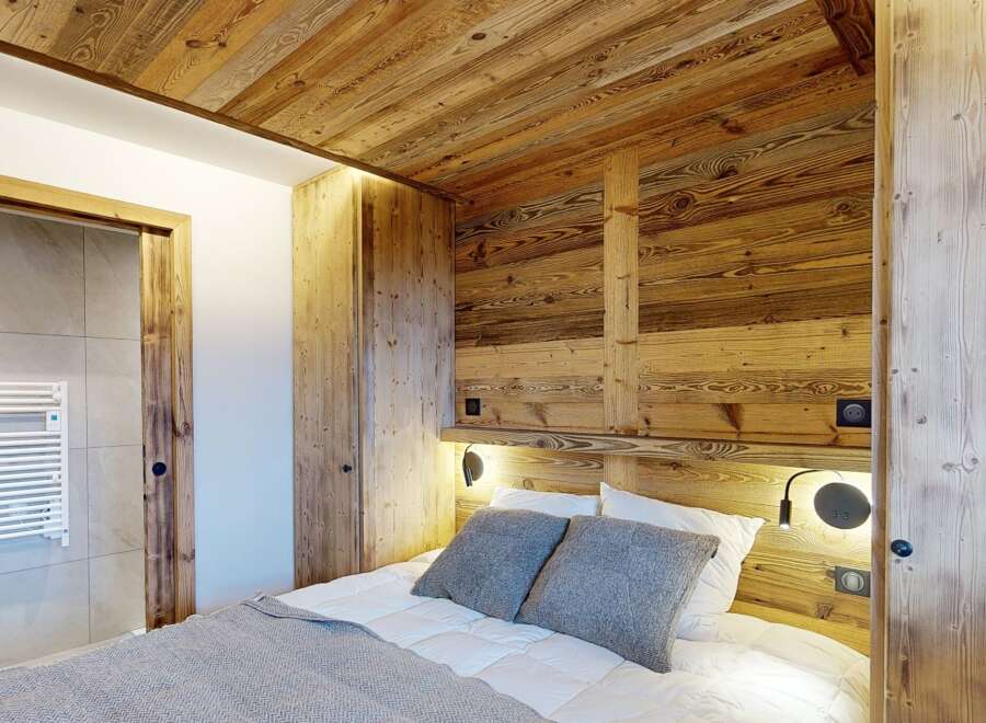 Experience rustic elegance in this stunning bedroom.