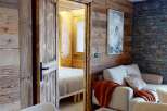Step into rustic elegance with this stunning property, showcasing exquisite wooden paneling throughout.