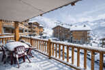 Experience the ultimate winter getaway in this stunning ski chalet, offering breathtaking mountain views and a cozy atmosphere.