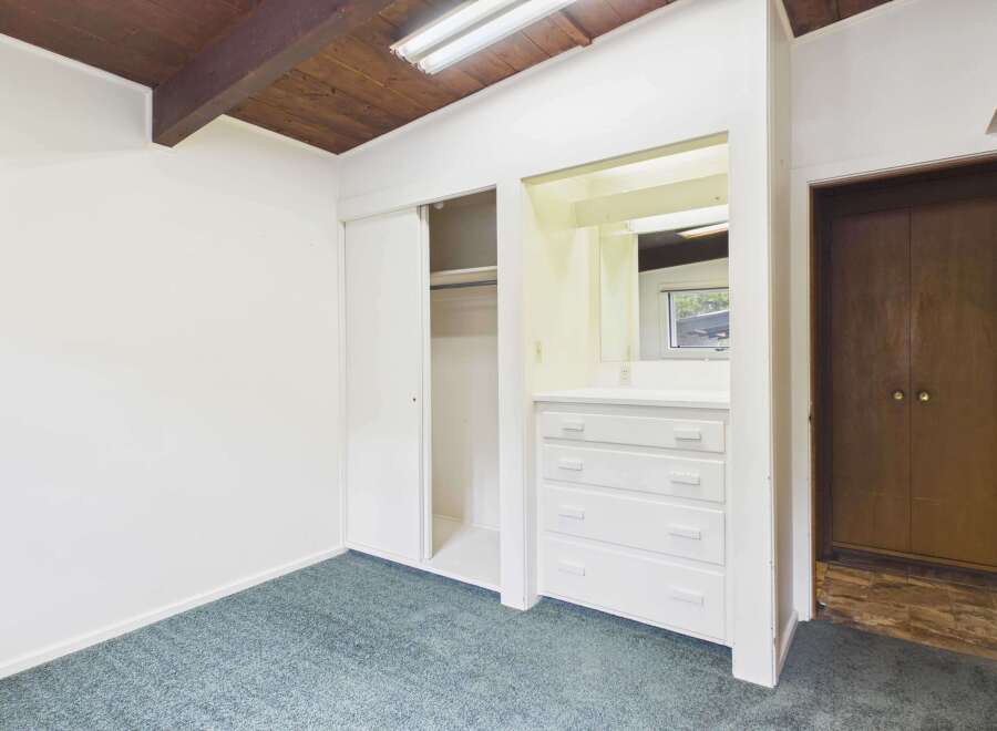 This inviting bedroom features a spacious layout with ample natural light.