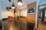This modern kitchen boasts sleek design and functionality, perfect for culinary enthusiasts.