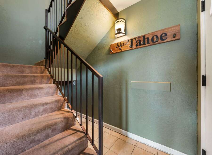 Step into this inviting home and be greeted by a charming staircase.