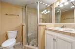 Step into this beautifully designed bathroom featuring a spacious shower with a glass enclosure.
