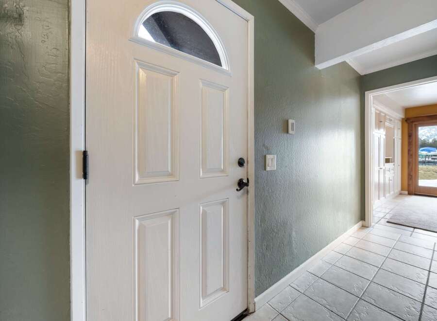 Step inside this inviting home and be greeted by a bright and airy entryway.