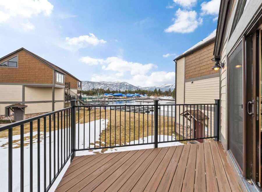 Enjoy stunning views from this beautiful property! This home features a spacious deck, perfect for relaxing and taking in the scenery.
