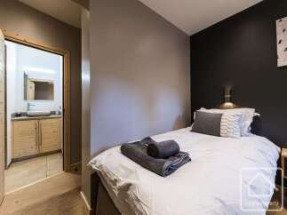 Discover the charm of this cozy bedroom, perfect for a relaxing getaway.