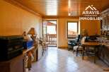 Discover the charm of this inviting property, featuring a warm and welcoming interior with wooden accents throughout.