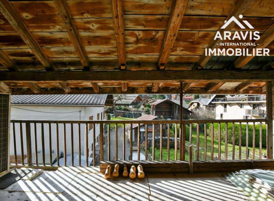 Discover the charm of this property, featuring a rustic wooden ceiling and a balcony offering stunning views.